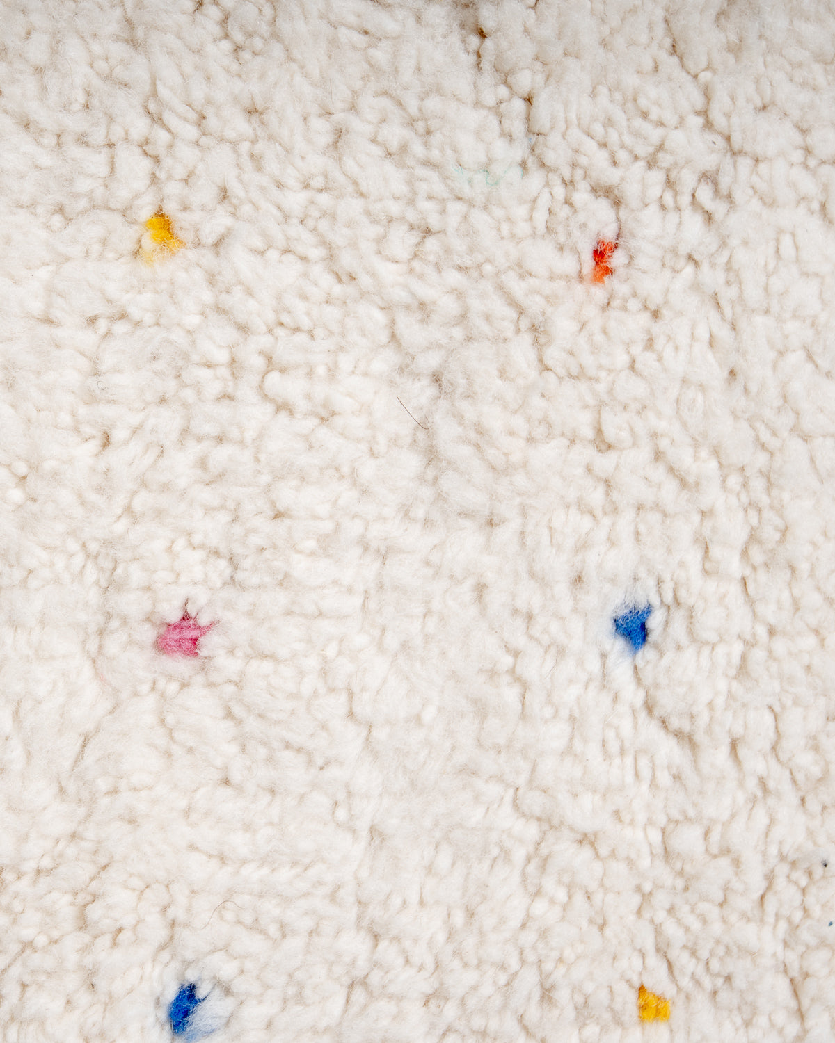 Modern, designer, handcrafted Berber rug from Morocco. Beniourain carpet with beautiful colours and patterns and fluffy wool texture.